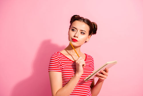 Girl Writing Pink Background