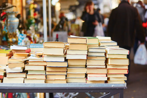 Stack of Books on Table Outside